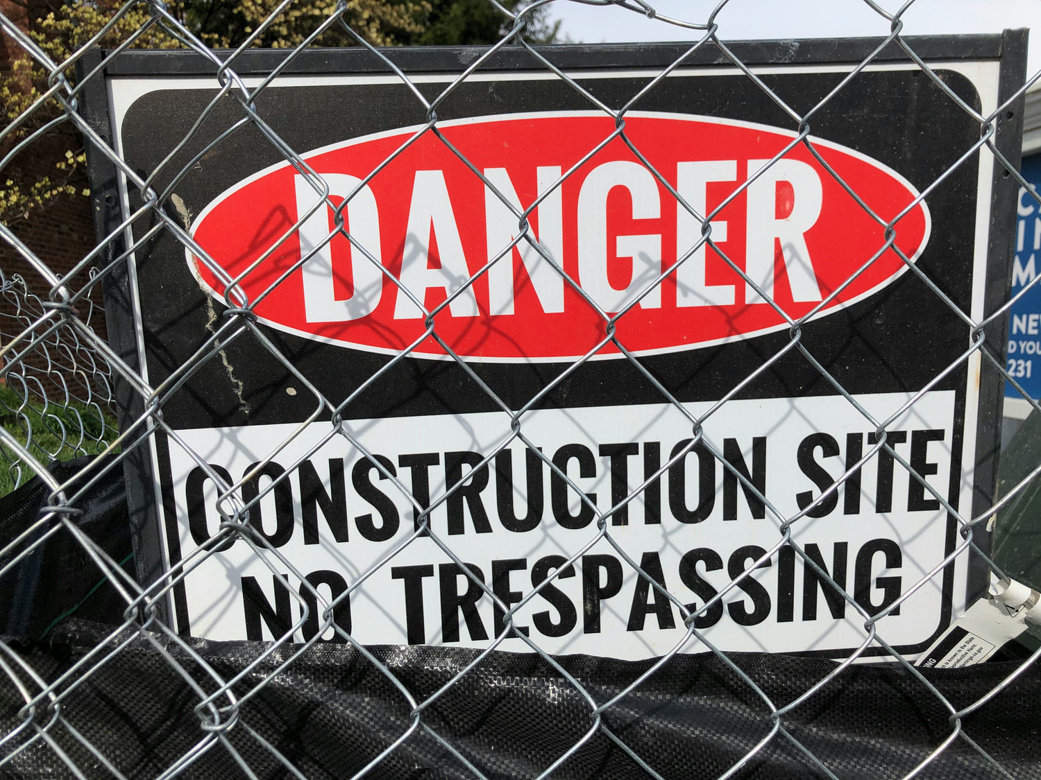 Why are safety signs so important for construction sites?